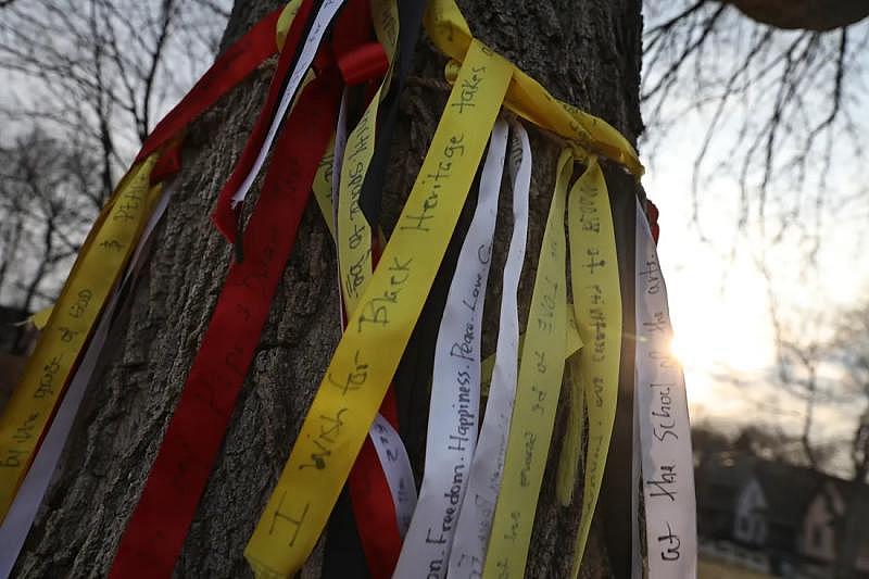 Banner ribbons with wishes written on them hang from a box elder tree in an empty lot along Joseph Avenue. The wishes were written by members of The Avenue BlackBox Theatre, which is across the street. SHAWN DOWD/DEMOCRAT AND CHRONICLE