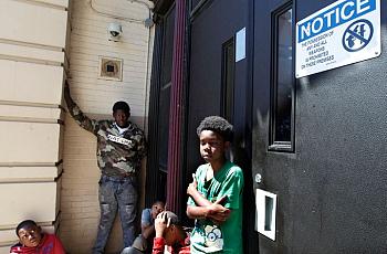 A youth shares his story about violence during a breakout session at the "We Got This" program in June. Other boys in the group 