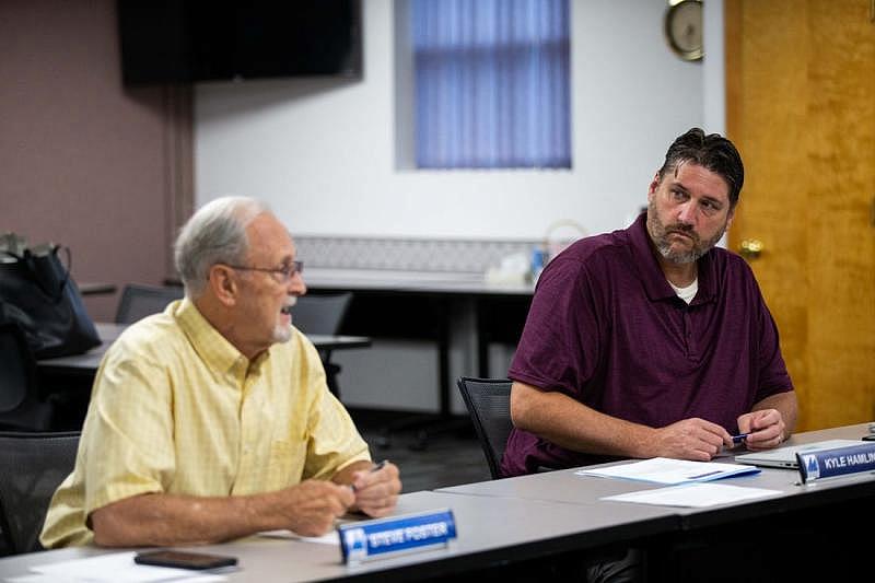 Montcalm Area ISD Superintendent Kyle Hamlin listens to board President Steve Foster during a September board meeting Thursday, Sept. 15, 2022, in Stanton, MI. The district of fewer than 500 students has used seclusion practices more than 4,000 times over the past five school years. District officials have declined to answer questions regarding the practice of seclusion on its students. CODY SCANLAN/HOLLAND SENTINEL