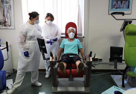 Medical workers taking care of a patient