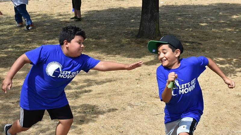 Kids play at East Boston's Memorial Park as part of the health program Let's Go Movin'.