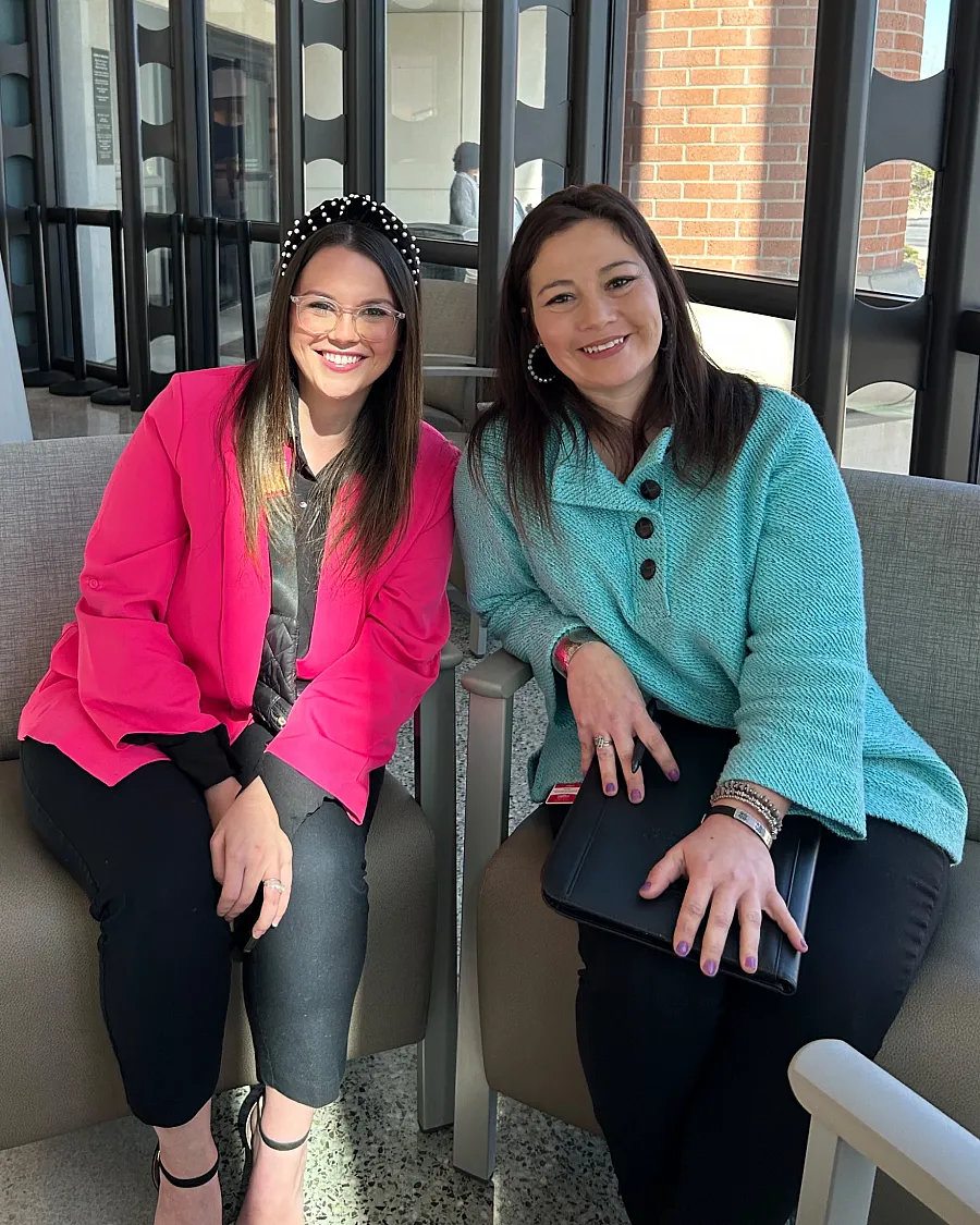 An image of Brooklynn Colburn and Jenifer Peña-Lasiter sitting side by side