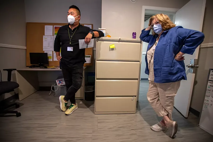 Two mental health professionals waiting in a clinic