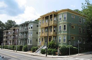 Image of a building at turn from across the street