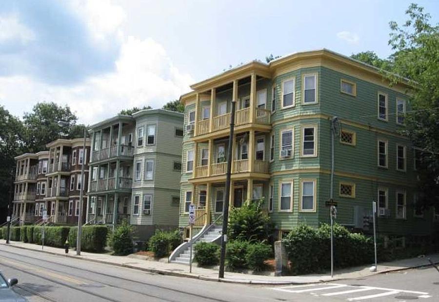 Image of a building at turn from across the street