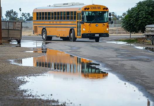 A West Park School District school bus turns onto South Prospect Avenue from West Church Avenue south west of Fresno on Monday, 