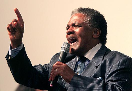  The Rev. Thomas Walker sings during a service at Ebenezer Missionary Baptist Church in Rocky Mount. He was diagnosed with an aggressive form of prostate cancer at age 47 and has become a prostate cancer activist. [Photo credit: Ethan Hyman/NewsObserver.com]