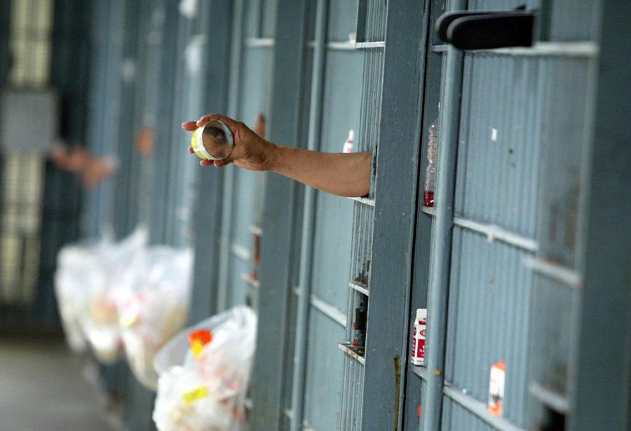 A person taking his hand out of the cell in Los Angeles Men's Central Jail.