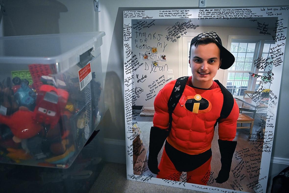 A photo of Zachary Chafos dressed as one of his favorite Pixar characters, Mr. Incredible, at his home in Clarksville, Md