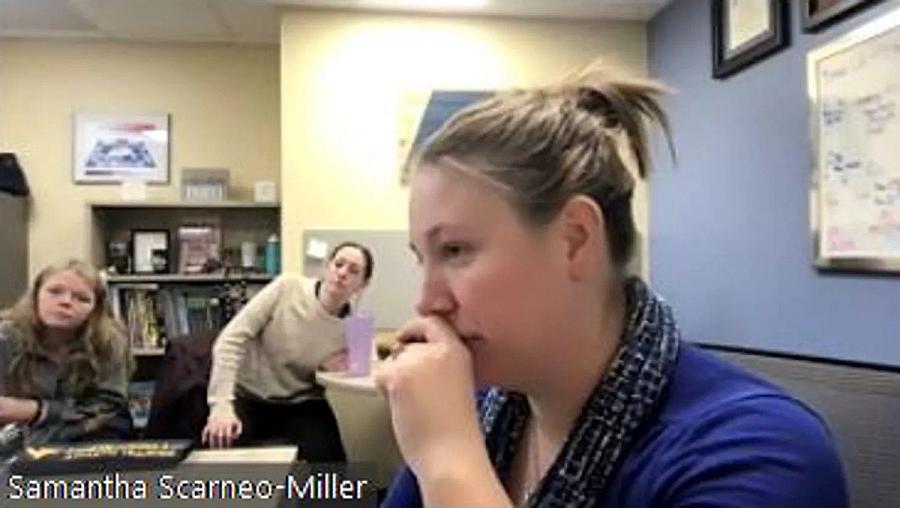 Photo from the video call platform where university teacher is speaking at video call with her masters students