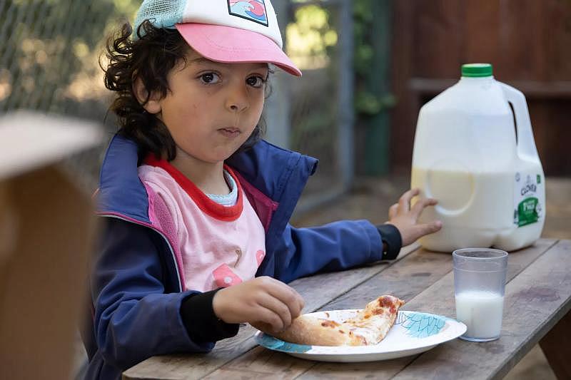 A child eats lunch on Pizza Friday at Baby Steps on Friday, Nov. 18, 2022, in San Francisco.(Paul Kuroda / For The San Diego Union-Tribune)