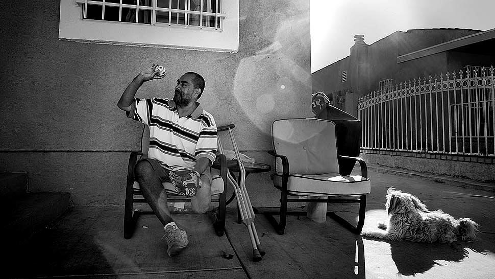 Carlos Sanchez ignored his diabetes for 15 years and failed to take his medication. It wound up costing him part of a leg. Here, he plays catch with his nephew outside his brother's home in South Los Angeles.