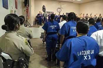 Police and jail members taking pledge.