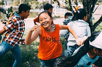 Kids running in park