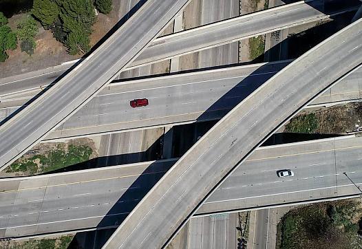 The Highways 41/180 interchange in Fresno appears nearly devoid of cars at around noon on Friday, March 27, 2020. Much of the ci