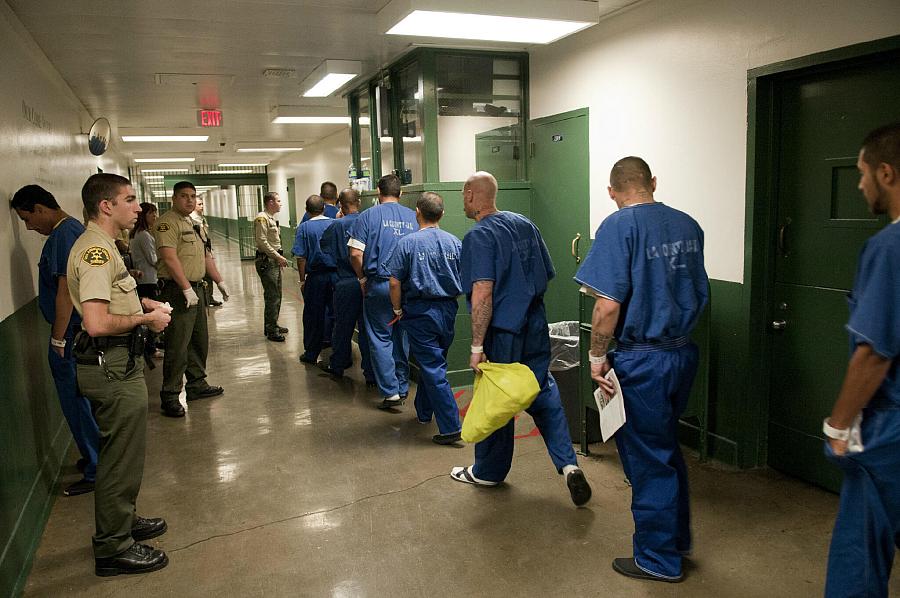 Image of people walking in jail