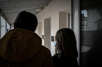 closeup image of a parent and child in a building