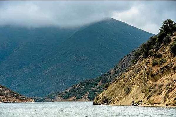 People fish along Pyramid Lake