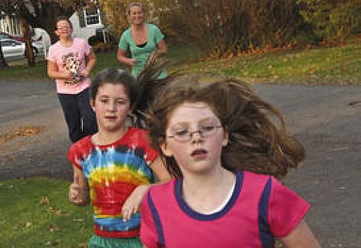 Girls in Randolph County's "Girls on the Run" club run for fun after school.