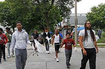 James E. Causey (right), a Milwaukee Journal Sentinel reporter, spent the summer of 2018 following boys as they participated in 